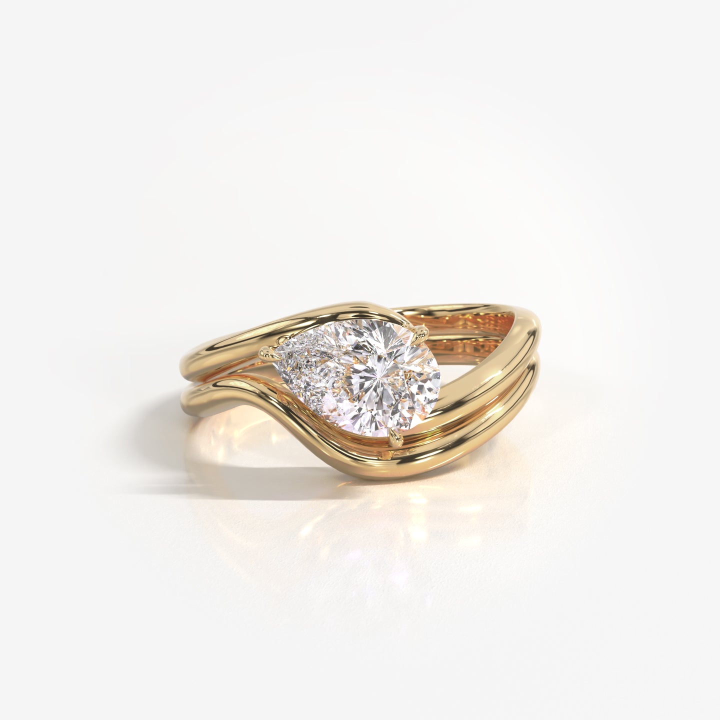 Eliana 14K solid yellow gold with pear-shaped diamond nesting ring and band set