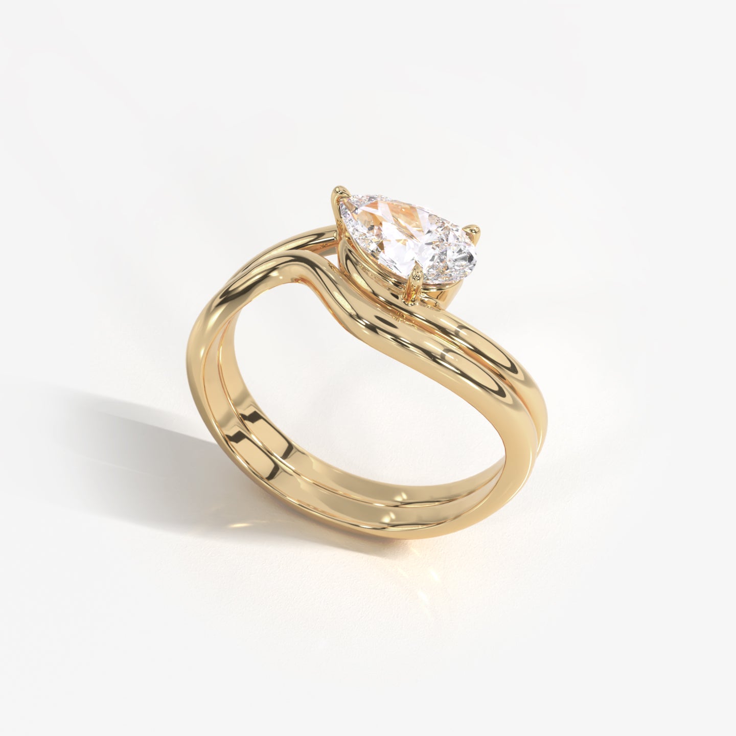 Eliana 14K solid yellow gold with pear-shaped diamond nesting ring and band set
