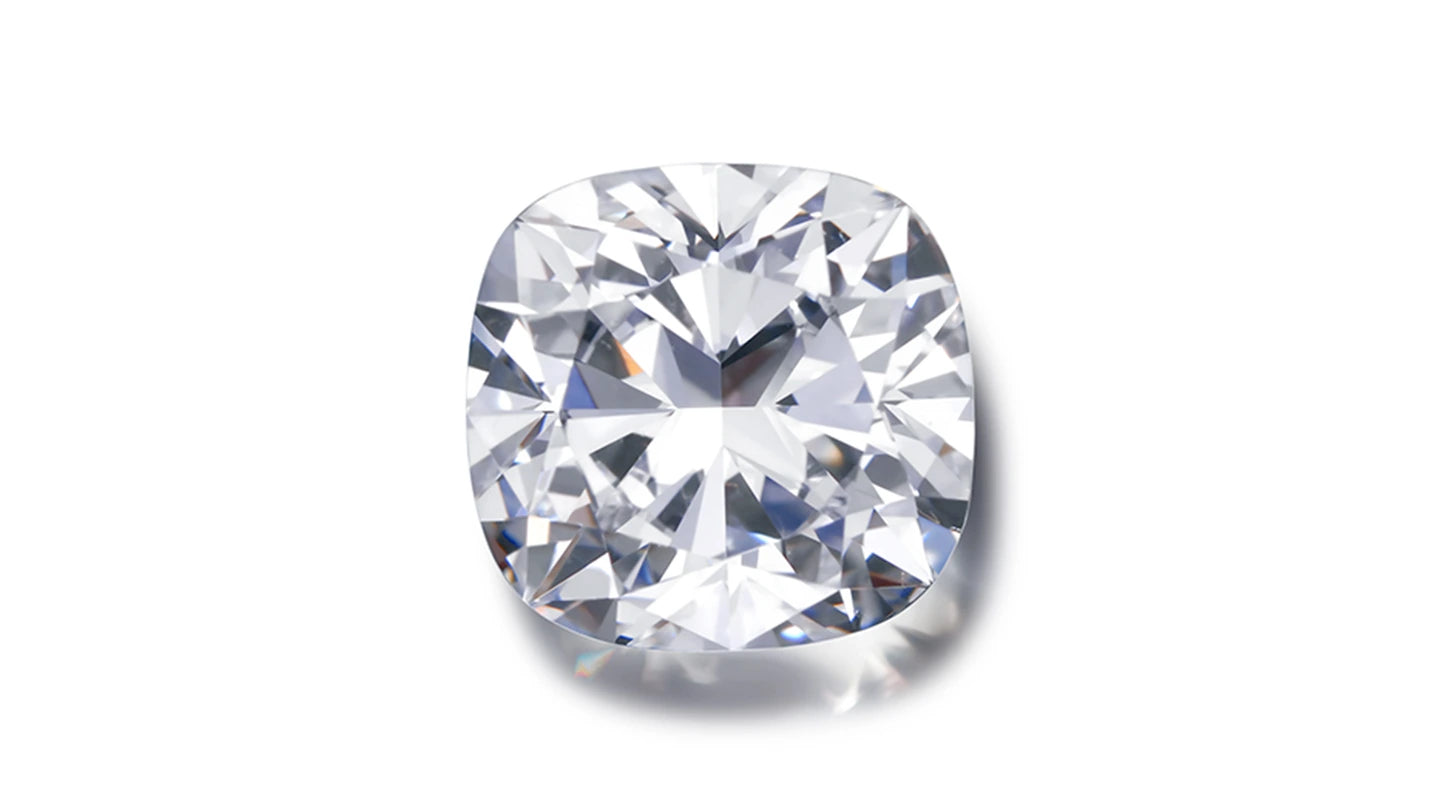 The cushion cut diamond features soft, rounded corners and a pillow-like shape that exudes vintage charm. Known for its warm, subtle sparkle, it offers a graceful balance between classic elegance and modern sophistication.
