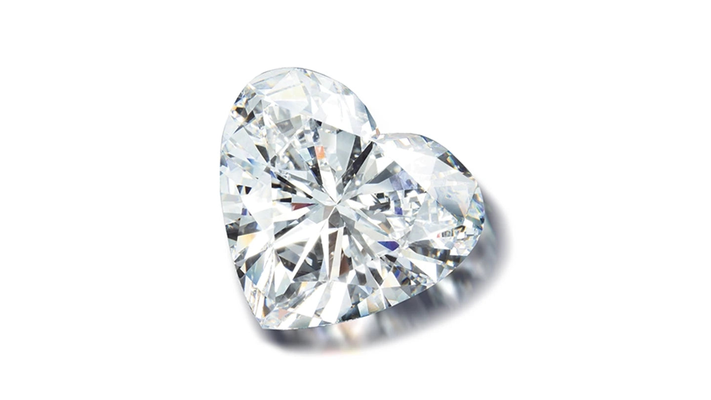 The heart-shaped diamond is a timeless symbol of love, featuring a distinctive silhouette with a cleft at the top, rounded lobes and a pointed tip. This romantic cut blends brilliant sparkle with deep meaning.
