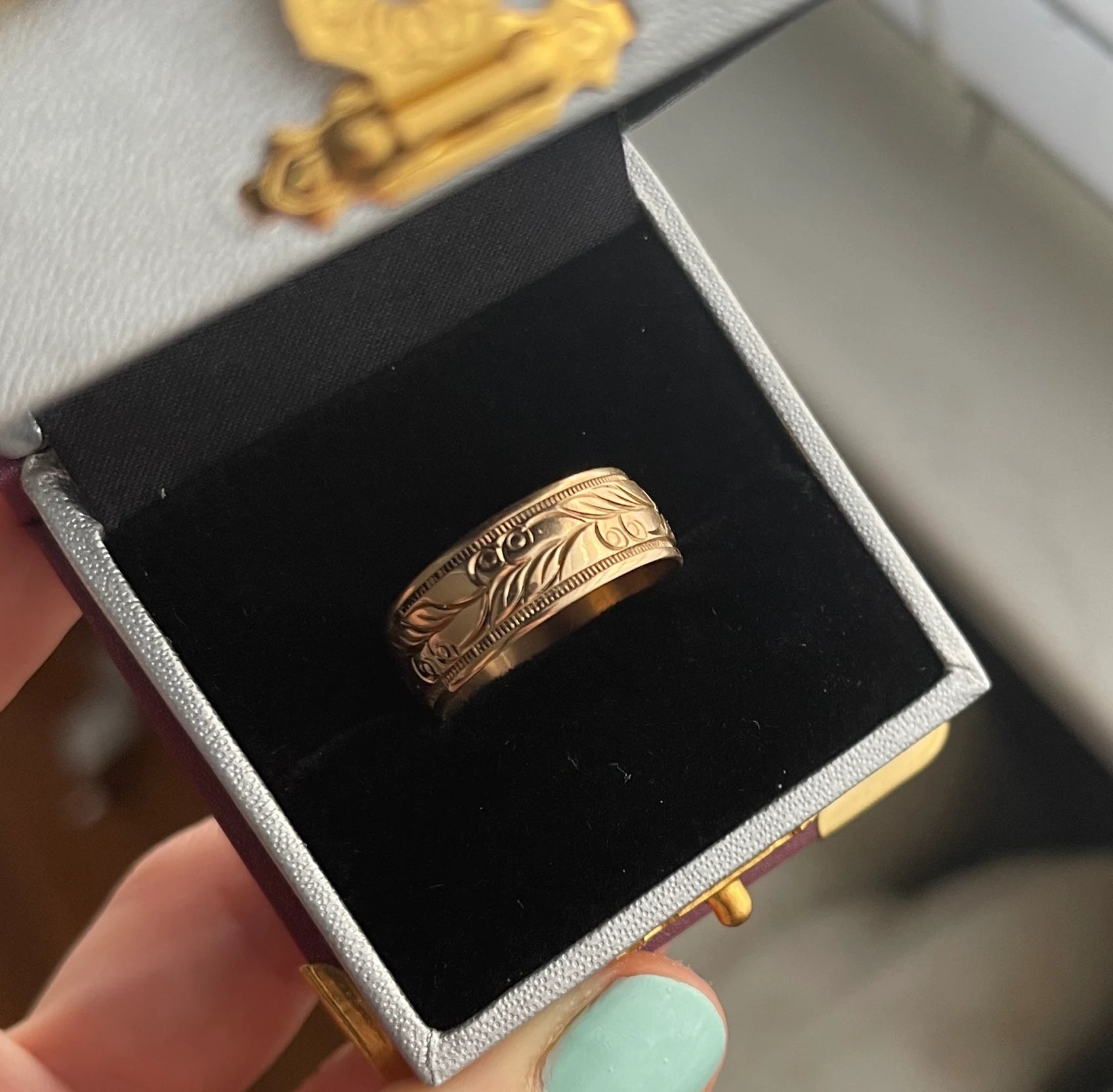 golden engraved wedding band